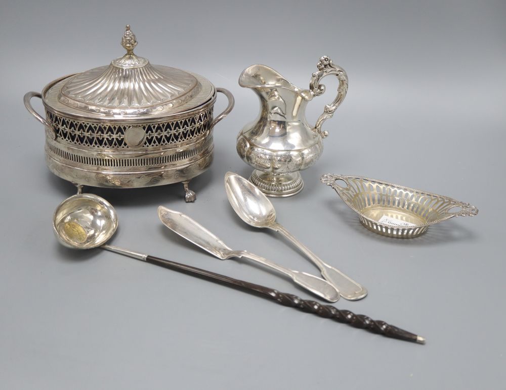 A George III silver and balleen toddy ladle, an 800 standard basket dish, a William IV silver butter knife, a French dessert spoon, a w